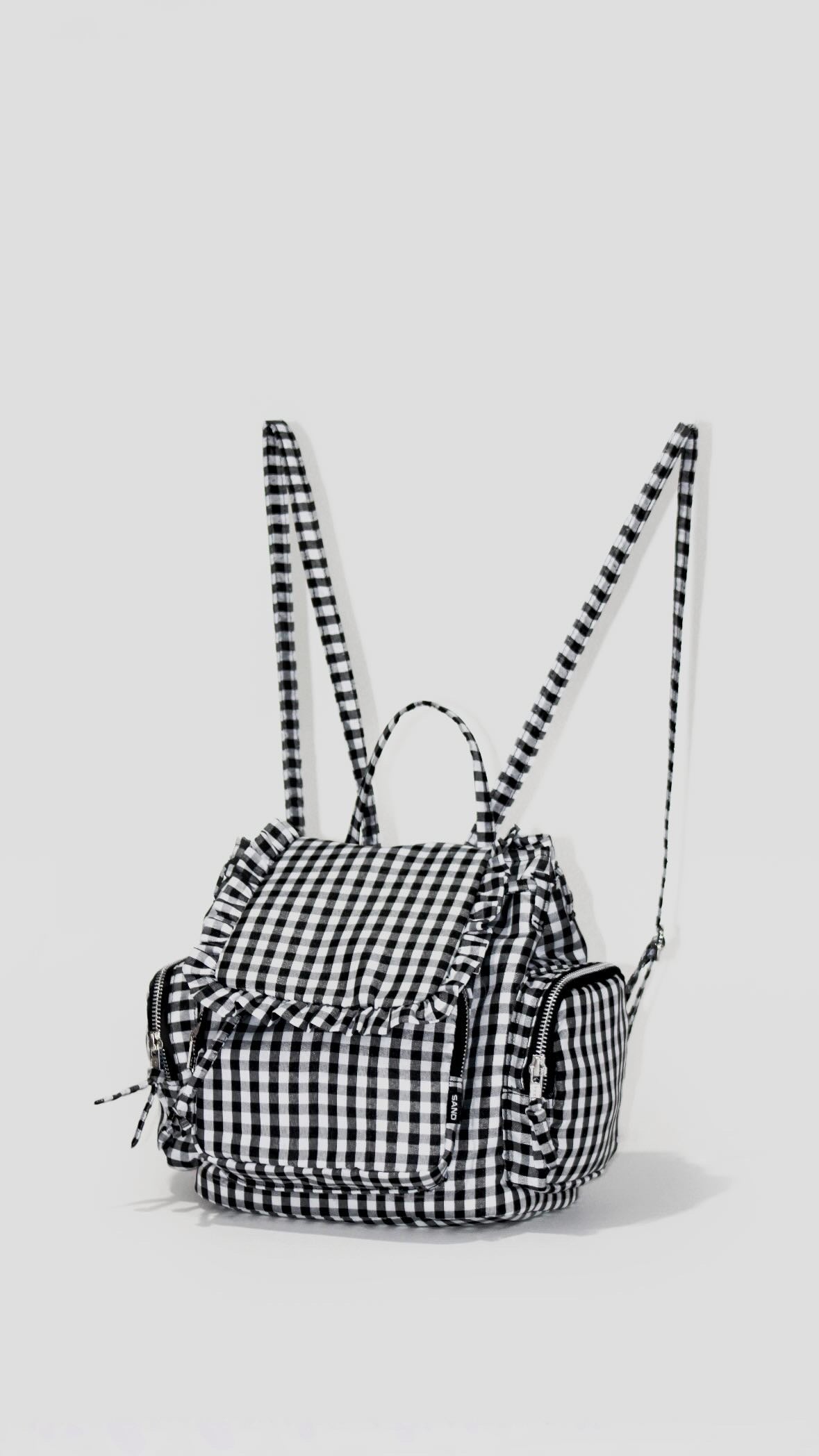 Mochila volantes blanco y negro